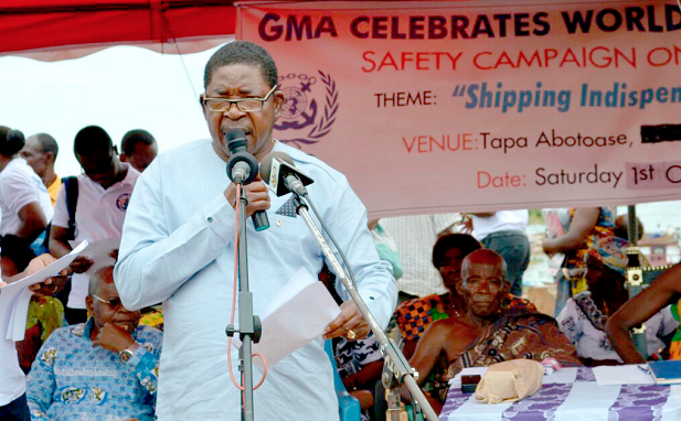  Rev Peter Issak Azuma, Director General of Ghana Maritime Authority, addressing boat operators at Tapa Abotoase during the World Maritime Day